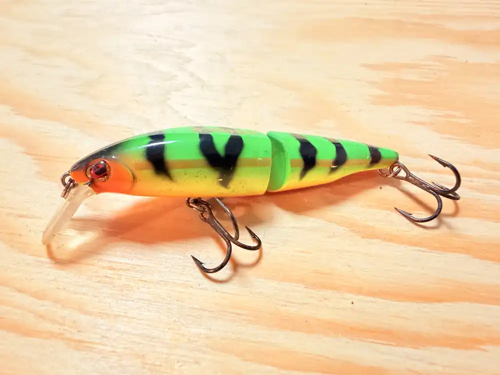 Wobler SÉBILE Swingtail Minnow 70FL / 7 cm / 7 g / 0,5-1,0 m Vrácení Zdarma